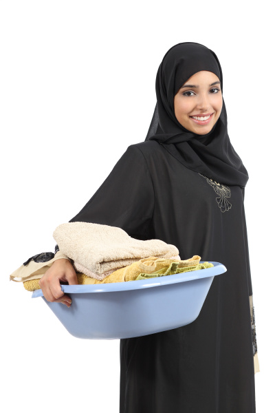 Hermosa árabe cargando ropa - Stockphoto #10076574 Agencia stock
